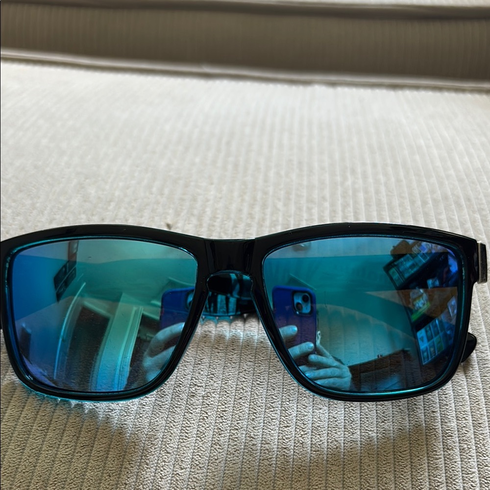 Stylish Black Sunglasses with Blue Lenses